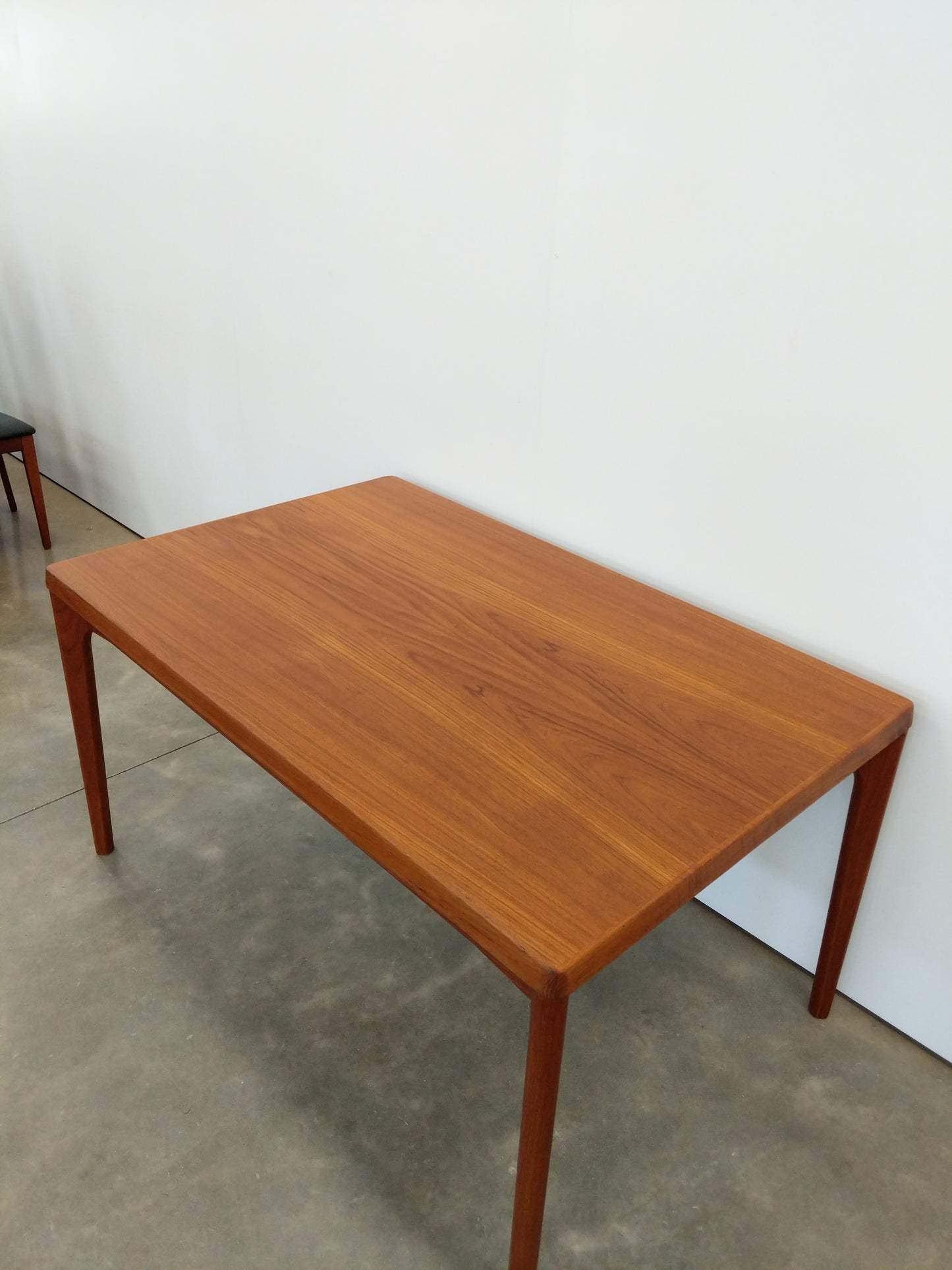 Vintage Danish Modern Teak Extendable Dining Table by Henning Kjaernulf