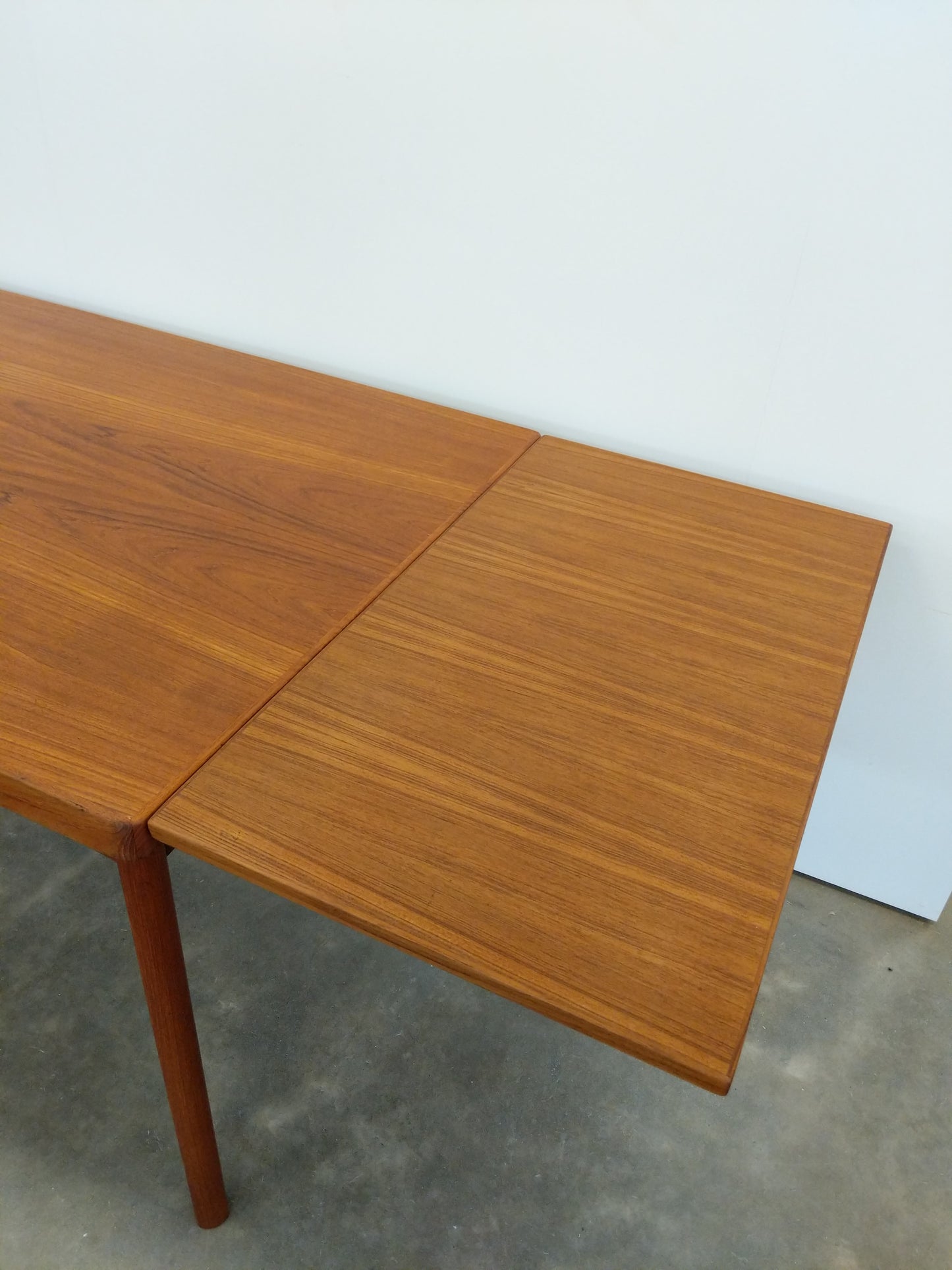 Vintage Danish Modern Teak Extendable Dining Table by Henning Kjaernulf