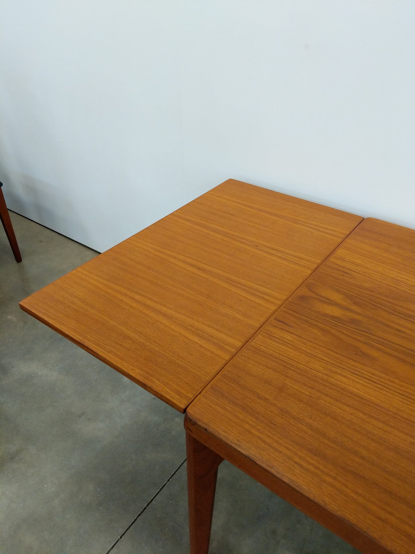 Vintage Danish Modern Teak Extendable Dining Table by Henning Kjaernulf