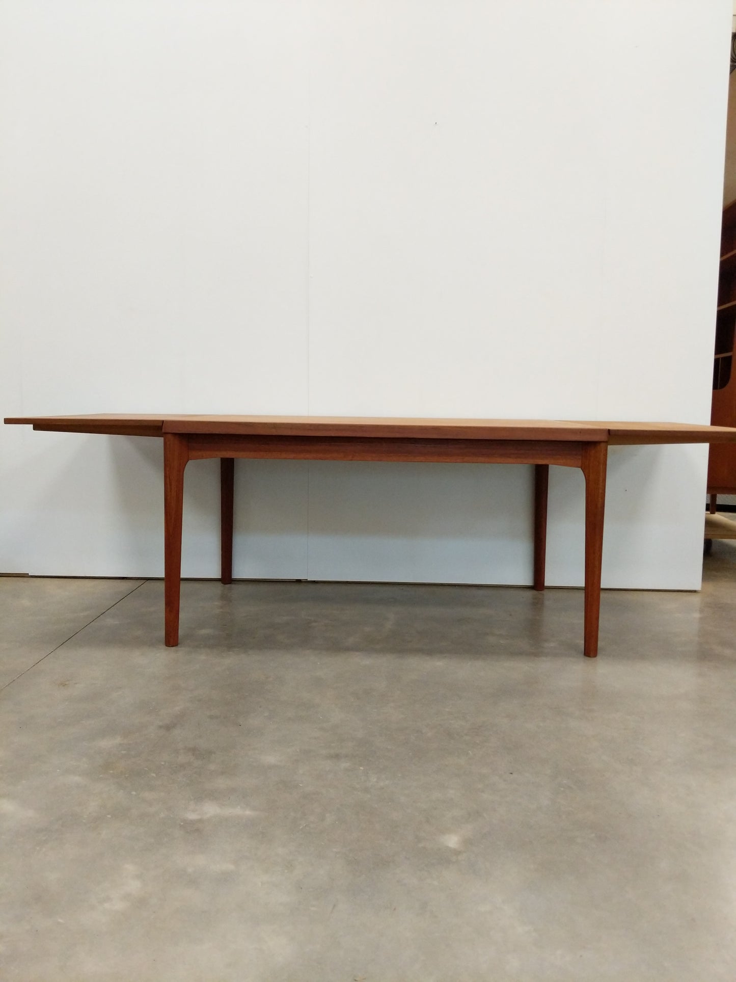 Vintage Danish Modern Teak Extendable Dining Table by Henning Kjaernulf