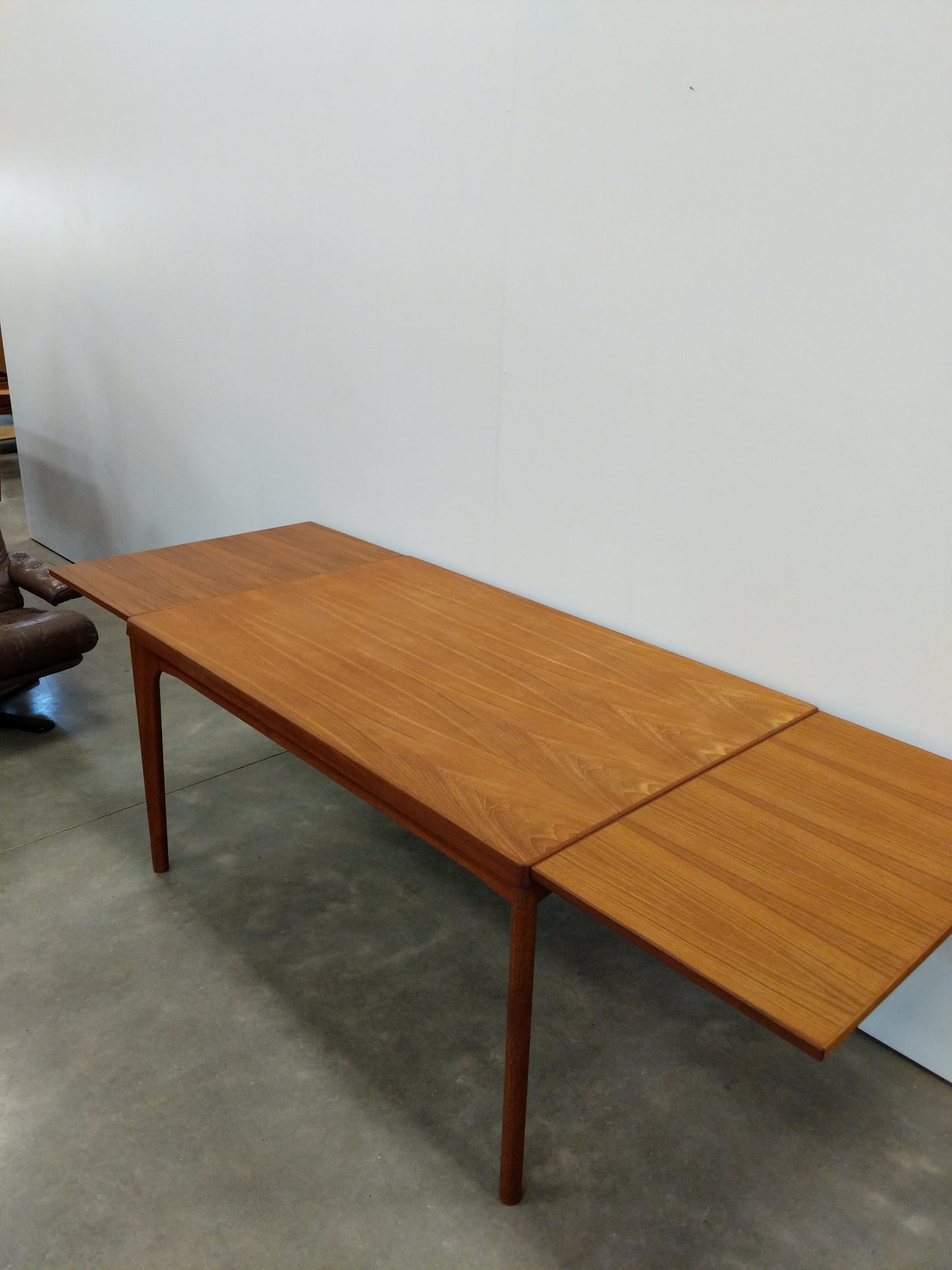 Vintage Danish Modern Teak Extendable Dining Table by Henning Kjaernulf