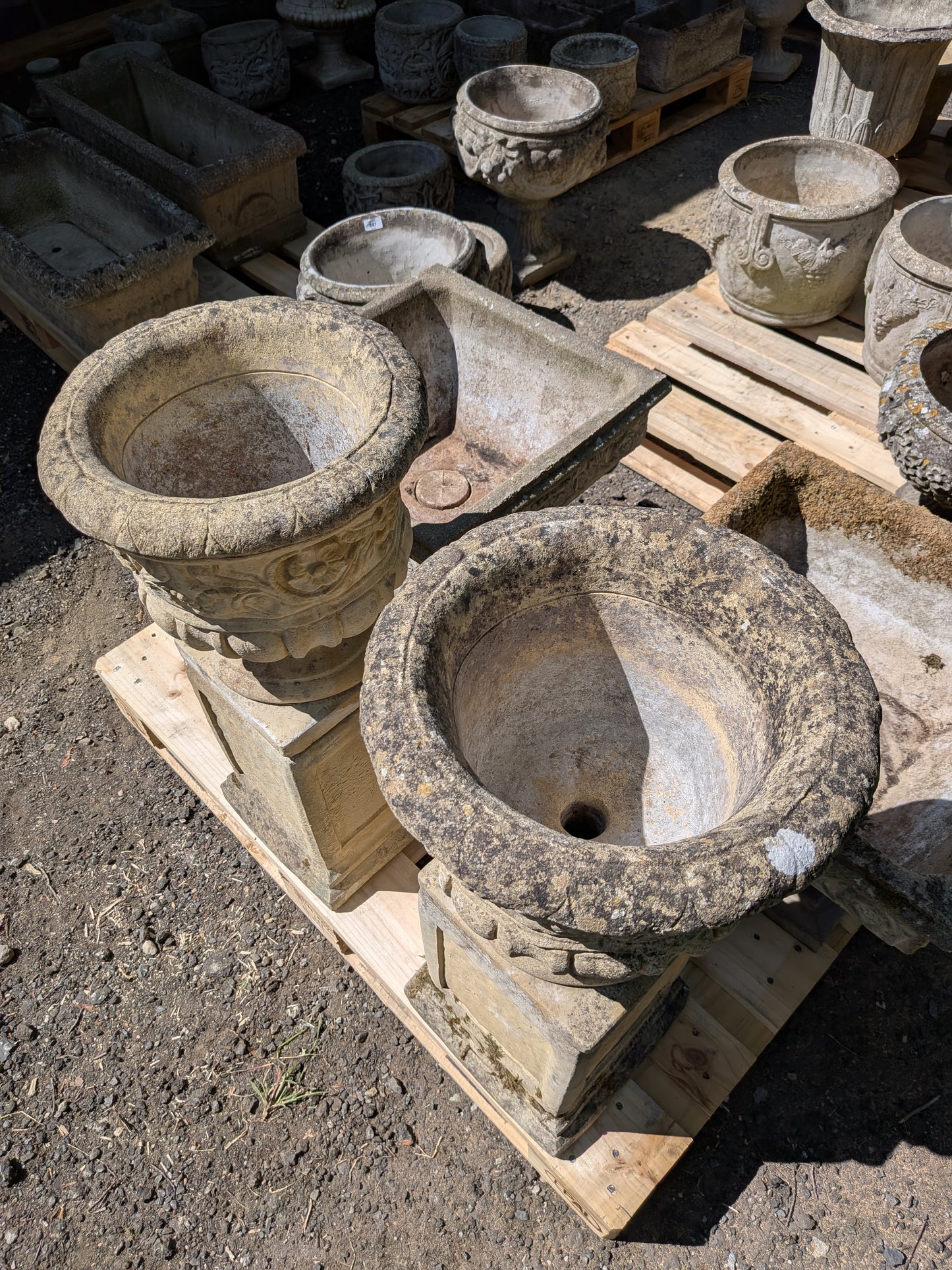 Pair of British Cast Stone Planters on Plinths