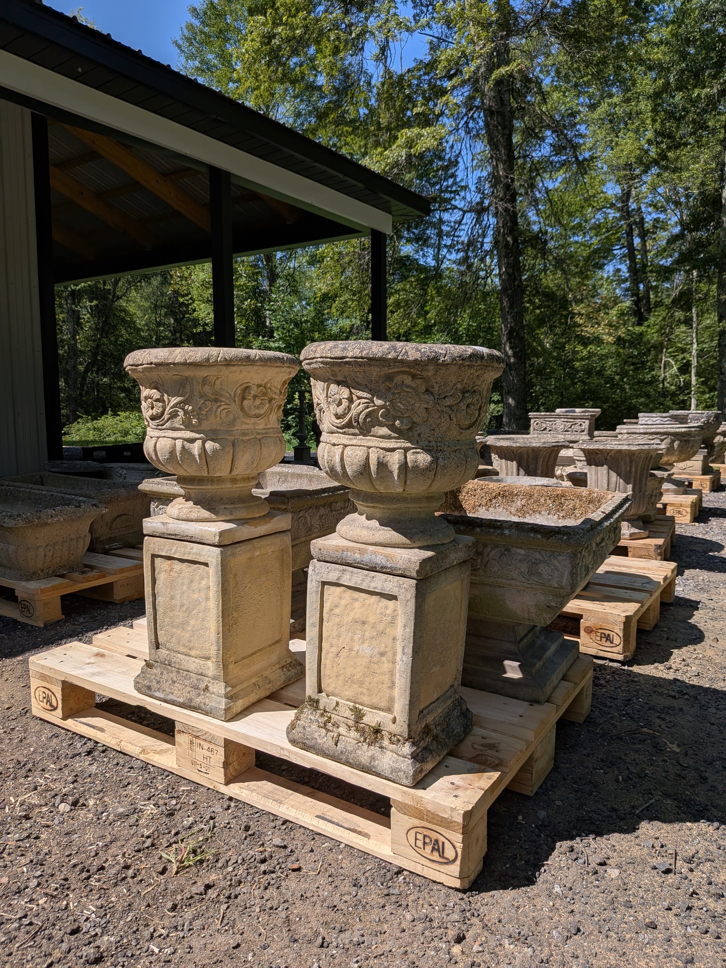 Pair of British Cast Stone Planters on Plinths