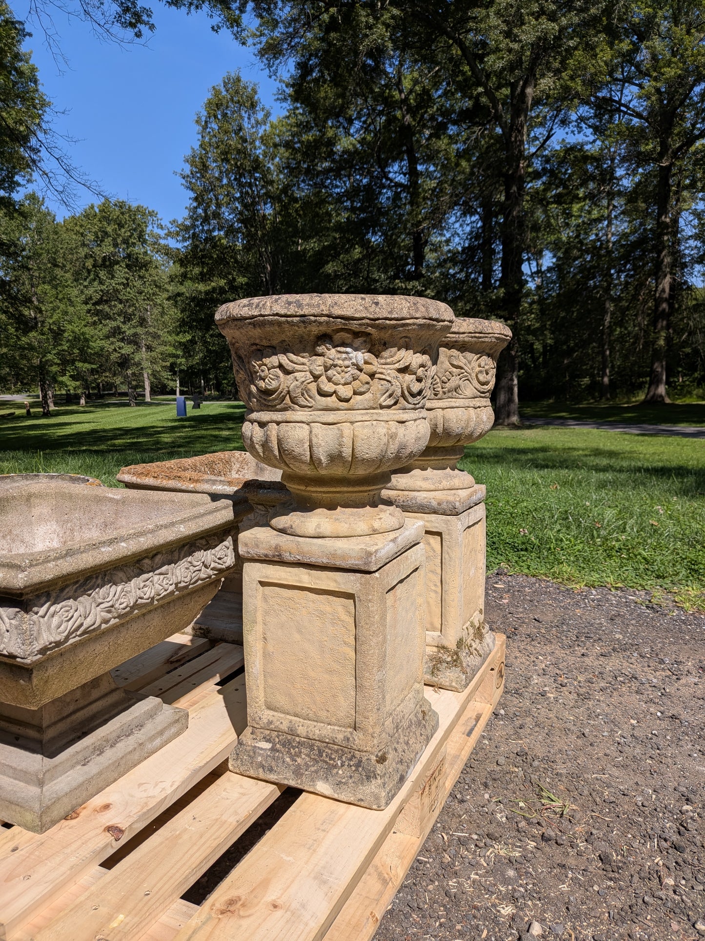 Pair of British Cast Stone Planters on Plinths